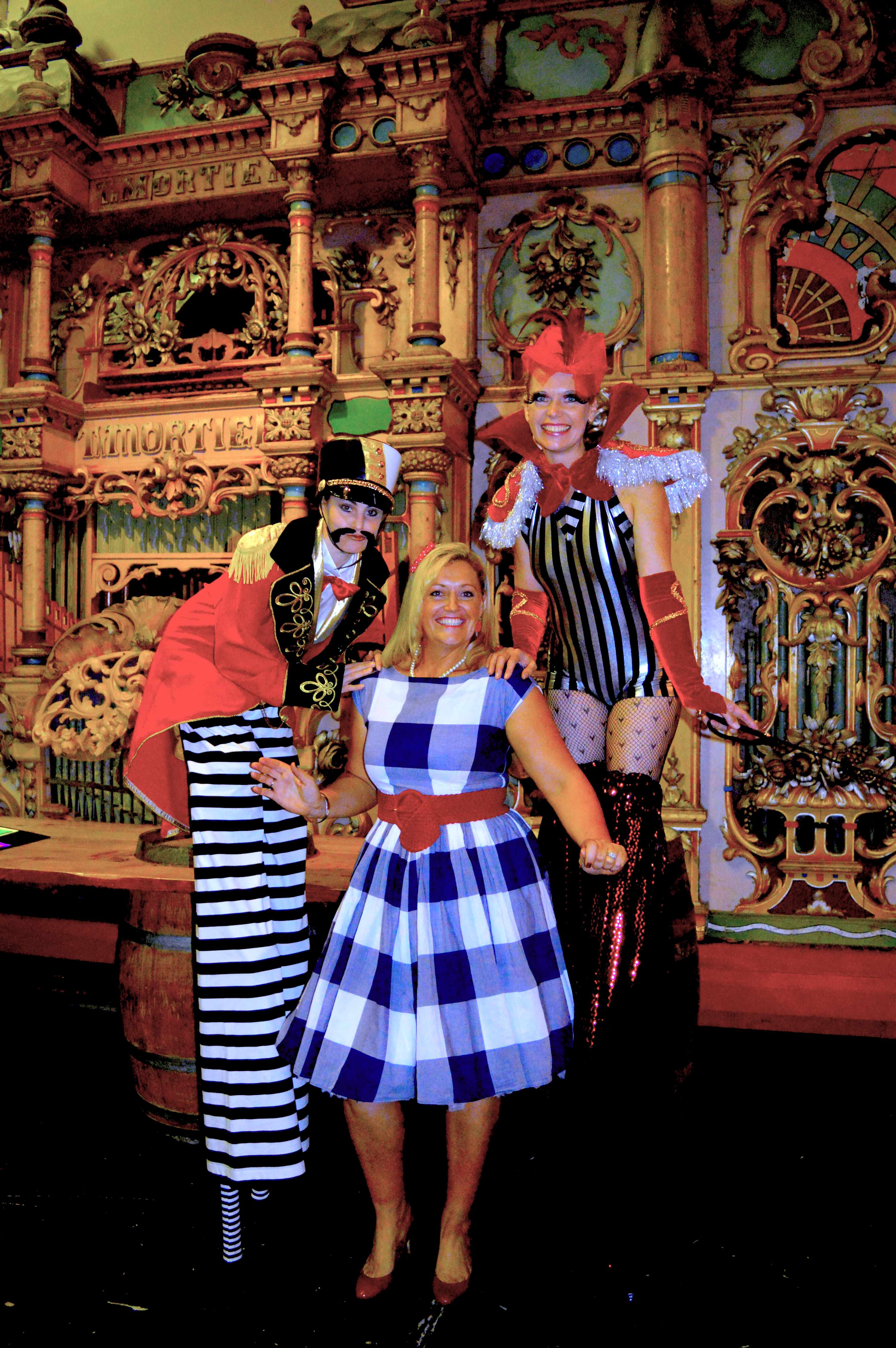Ring Mistress and Ring Master on Stilts with host