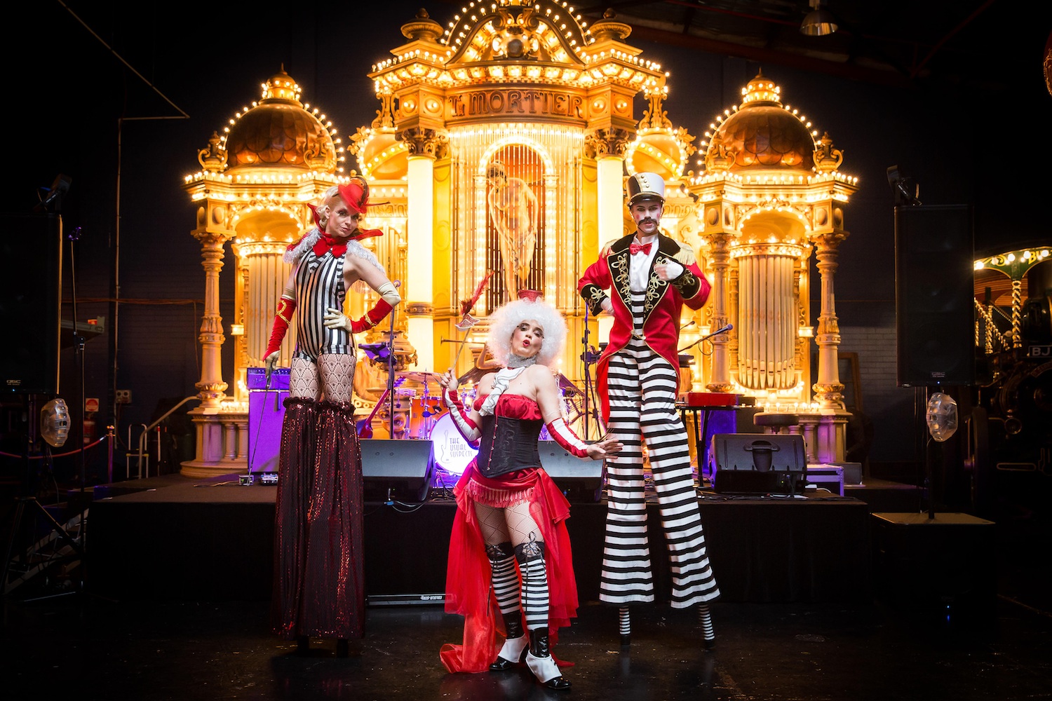 Stilt Costumes with Candy Stripe Circus Ring Mistress and Ring Master on Stilts